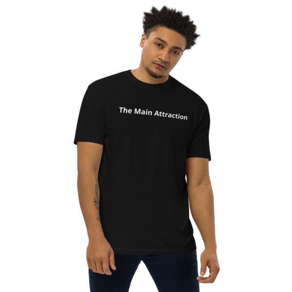 A man wearing a black t-shirt with the words " do more awesome ".